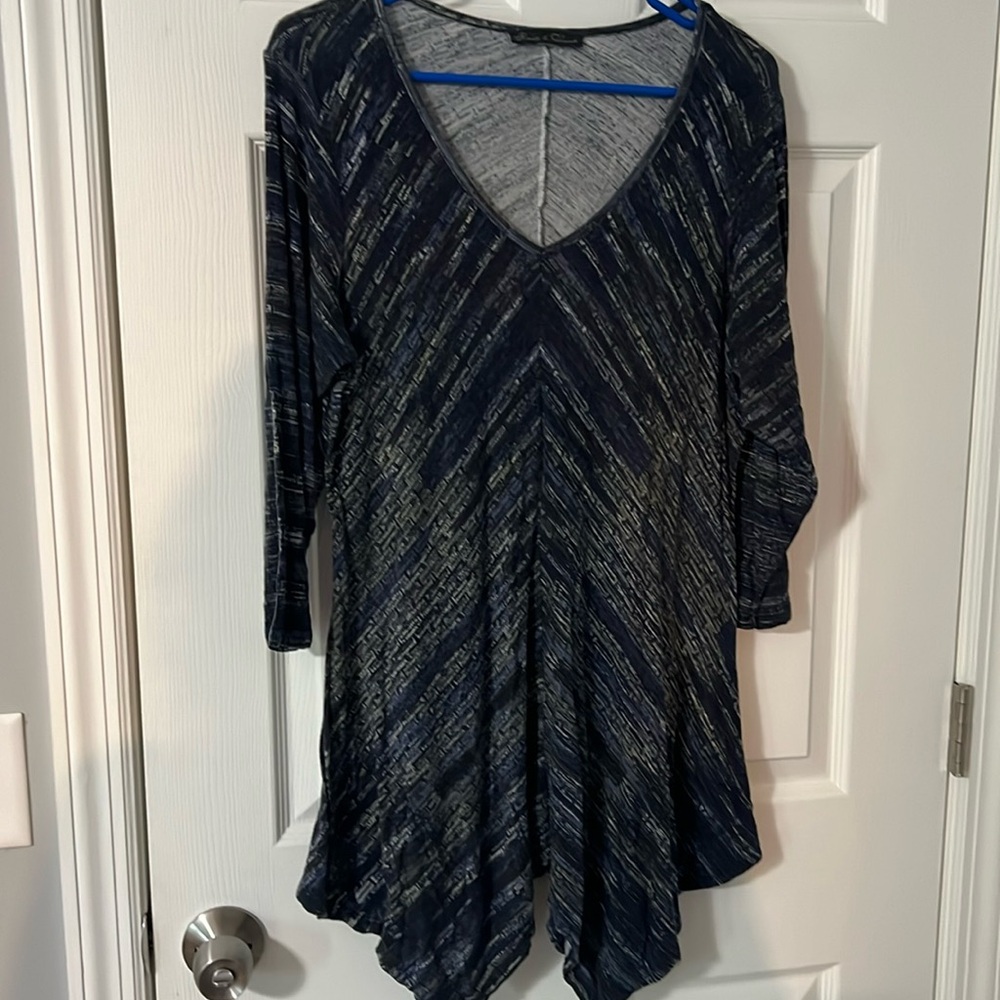 Shark tail hem tunic